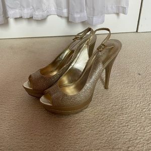 Bakers sparkly gold pumps